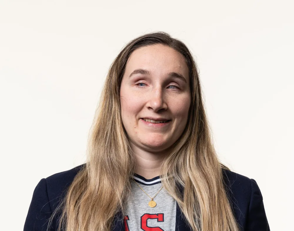 Eliana Mason in a Team USA blazer against a white studio background.